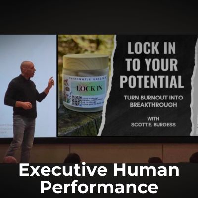 Scott E. Burgess teaching executive human performance with LOCK IN planner, guiding leaders on focus, energy, and sustainable performance.