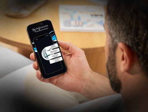 Client reviewing a clear, research-backed MyDeficiencies report on their phone to better understand health and nutrient needs.