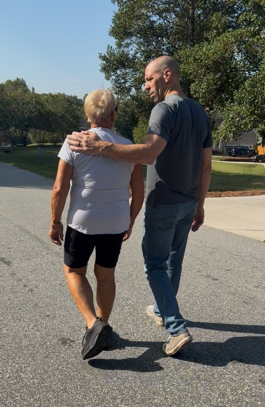 Scott E. Burgess walking with a client during breathwork practice, part of the BALANCED Ecosystem for stress relief, clarity, and healing.
